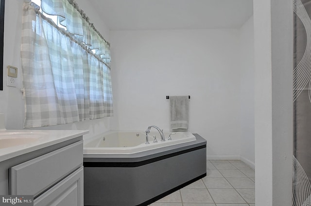 121 Sweetbriar Ln, Winchester, VA 22603 - bathroom featuring a tub with jets, tile patterned flooring, and vanity