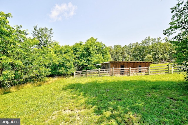 121 Sweetbriar Ln, Winchester, VA 22603 - view of yard with an outbuilding and a wooded view