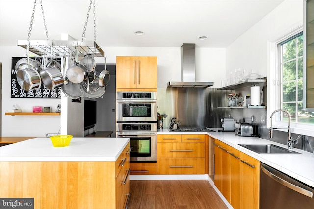 9 Hedgecroft Dr, Pennington, NJ 08534 - kitchen featuring appliances with stainless steel finishes, wall chimney range hood, dark wood-type flooring, light countertops, and open shelves