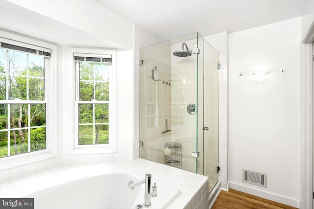 9 Hedgecroft Dr, Pennington, NJ 08534 - full bathroom with a stall shower, a garden tub, and wood finished floors