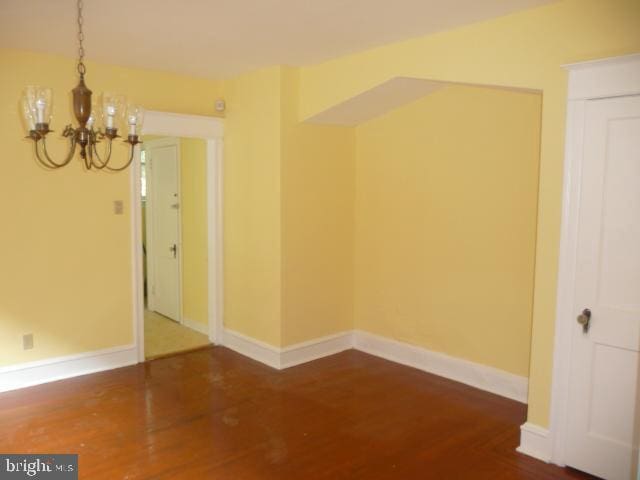 537 E Comly St, Philadelphia, PA 19120 - unfurnished dining area featuring a chandelier and wood finished floors