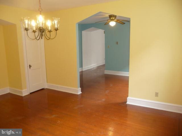 537 E Comly St, Philadelphia, PA 19120 - unfurnished room featuring a ceiling fan, wood finished floors, and a chandelier