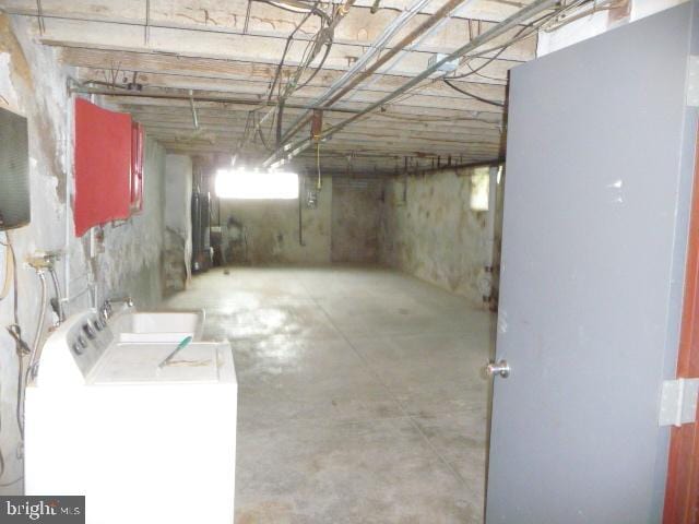 537 E Comly St, Philadelphia, PA 19120 - below grade area featuring washer and clothes dryer and a sink