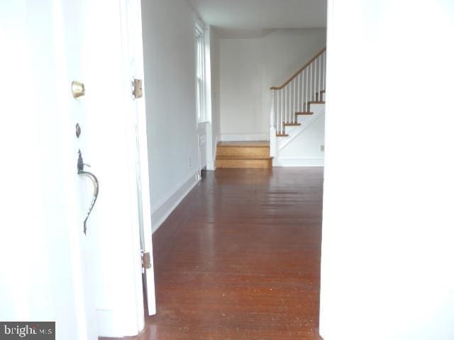 537 E Comly St, Philadelphia, PA 19120 - corridor featuring wood finished floors and stairway