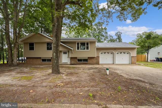 470 E Taunton Ave, West Berlin, NJ 08091 - view of front of home with a garage, driveway, and brick siding