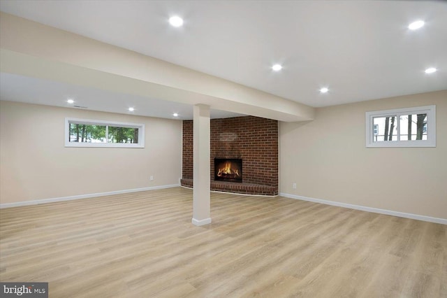 470 E Taunton Ave, West Berlin, NJ 08091 - basement featuring light wood-style flooring, a brick fireplace, and recessed lighting