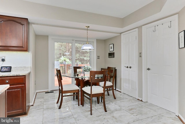 11166 Deuaughn Ct, Fairfax Station, VA 22039 - dining room with light marble finish floors and baseboards