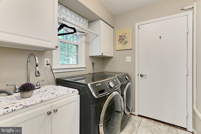 11166 Deuaughn Ct, Fairfax Station, VA 22039 - washroom featuring cabinet space, washer and dryer, and light tile patterned floors