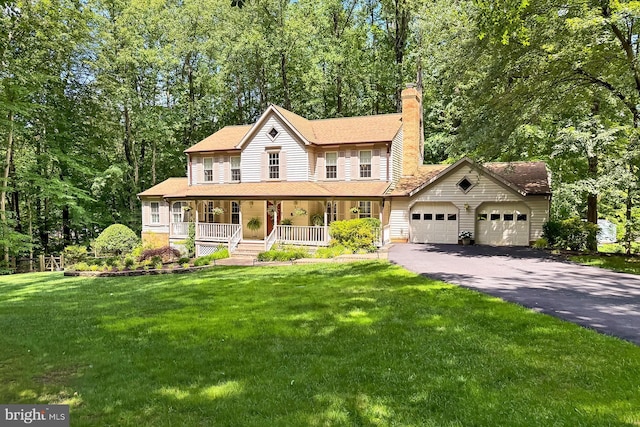 11166 Deuaughn Ct, Fairfax Station, VA 22039 - view of front of property featuring covered porch, an attached garage, driveway, a chimney, and a front yard