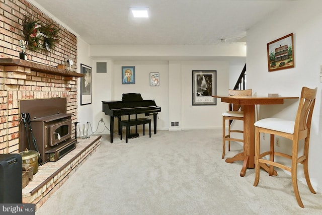 11166 Deuaughn Ct, Fairfax Station, VA 22039 - carpeted living area with a wood stove and baseboards