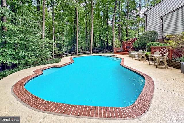 11166 Deuaughn Ct, Fairfax Station, VA 22039 - swimming pool featuring a patio