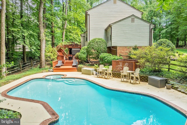 11166 Deuaughn Ct, Fairfax Station, VA 22039 - view of pool featuring a patio, a fenced backyard, a pool with connected hot tub, and view of scattered trees
