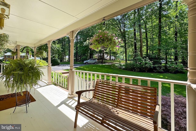 11166 Deuaughn Ct, Fairfax Station, VA 22039 - covered porch featuring a lawn