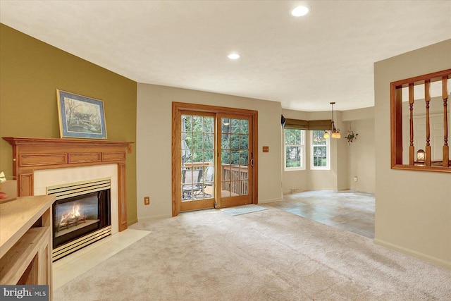 22 Piston Ct, Stewartstown, PA 17363 - unfurnished living room featuring recessed lighting, a high end fireplace, and light carpet
