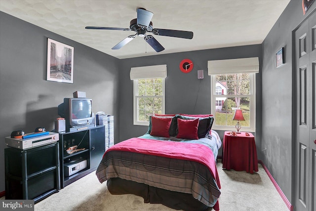 22 Piston Ct, Stewartstown, PA 17363 - carpeted bedroom with ceiling fan and baseboards