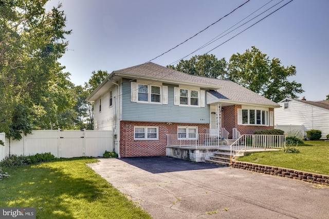 601 King George Rd, Cherry Hill, NJ 08034 - split level home featuring brick siding, driveway, and a gate