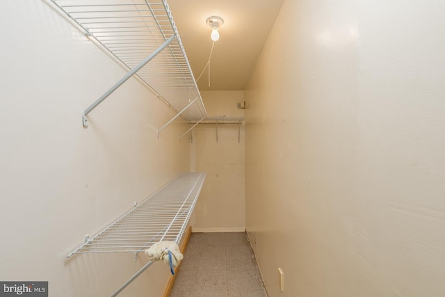 601 King George Rd, Cherry Hill, NJ 08034 - spacious closet featuring tile patterned floors