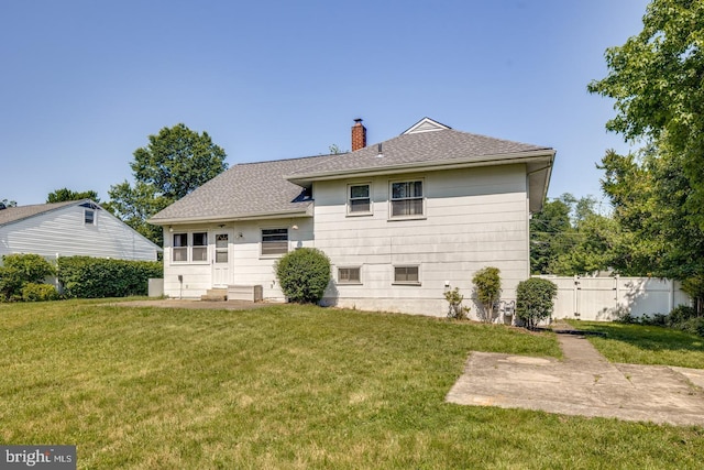 601 King George Rd, Cherry Hill, NJ 08034 - rear view of house featuring a chimney, a shingled roof, and a patio