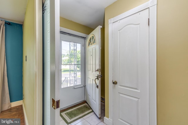 601 King George Rd, Cherry Hill, NJ 08034 - foyer with baseboards and tile patterned floors