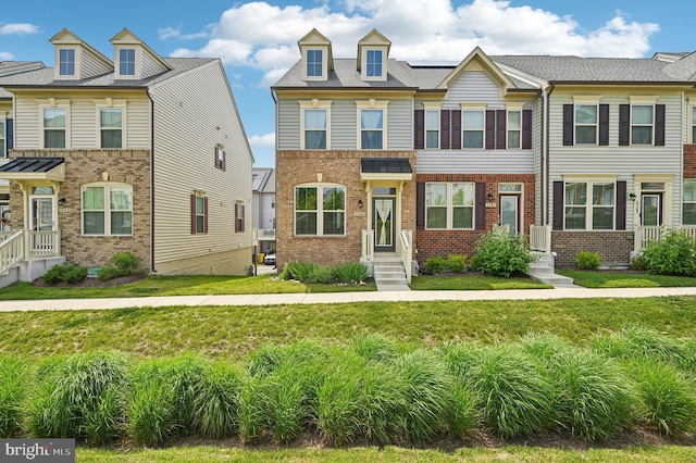 3745 Cedar Mountain Way, Hanover, MD 21076 - townhome / multi-family property featuring a front lawn and brick siding