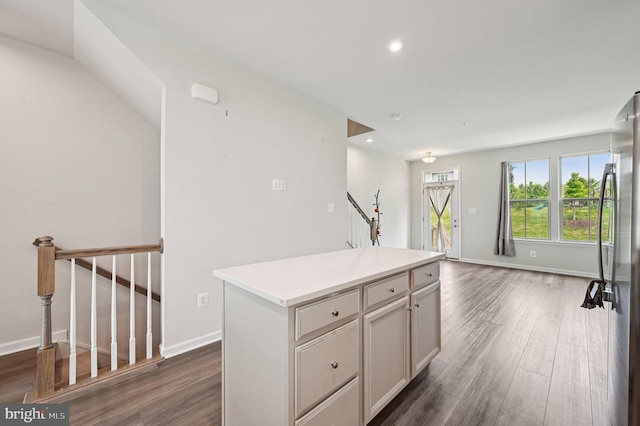 3745 Cedar Mountain Way, Hanover, MD 21076 - kitchen featuring dark wood-style floors, freestanding refrigerator, a center island, light countertops, and open floor plan
