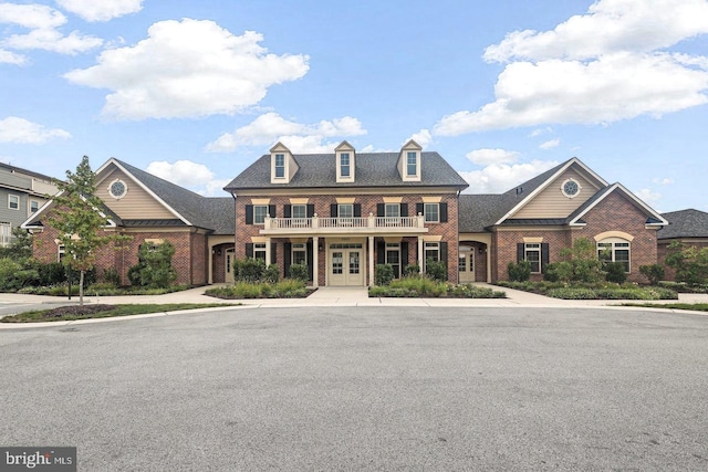 3745 Cedar Mountain Way, Hanover, MD 21076 - view of front of home with a balcony, brick siding, and french doors