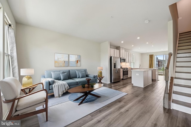 3745 Cedar Mountain Way, Hanover, MD 21076 - living area featuring stairs, dark wood finished floors, and recessed lighting