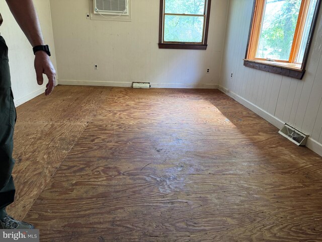 597 Equitation Ln, Felton, DE 19943 - spare room with wood finished floors and a wall mounted air conditioner
