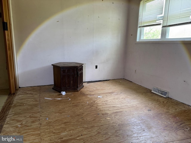 597 Equitation Ln, Felton, DE 19943 - empty room featuring a wood stove