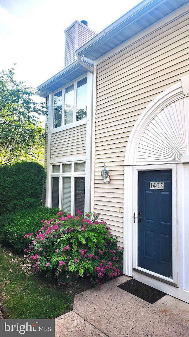 1405 Naomis Ct Unit 1405, North Wales, PA 19454 - doorway to property with a chimney