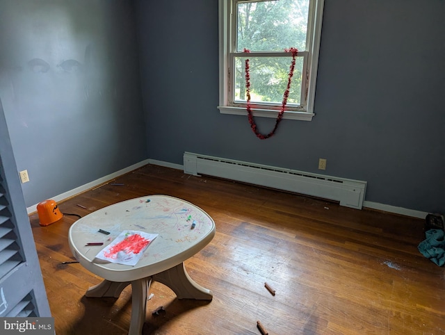 44 Chestnut St, Adamstown, PA 19501 - unfurnished room featuring a baseboard radiator and hardwood / wood-style flooring
