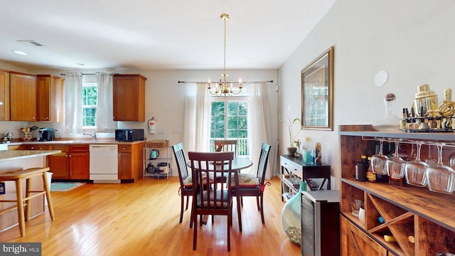 47 Buck Rd, Mays Landing, NJ 08330 - dining area with a chandelier and light wood-type flooring