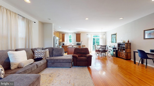 47 Buck Rd, Mays Landing, NJ 08330 - living area with recessed lighting, light wood-style floors, and a chandelier