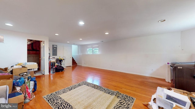 47 Buck Rd, Mays Landing, NJ 08330 - living area with stairs, electric panel, wood finished floors, recessed lighting, and washer / dryer