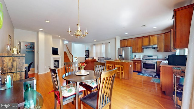 47 Buck Rd, Mays Landing, NJ 08330 - dining room featuring light wood-style flooring, recessed lighting, a chandelier, and stairs