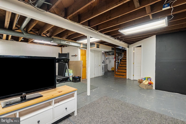 5200 Daybreak Ct, Baltimore, MD 21206 - below grade area featuring stairs and concrete block wall