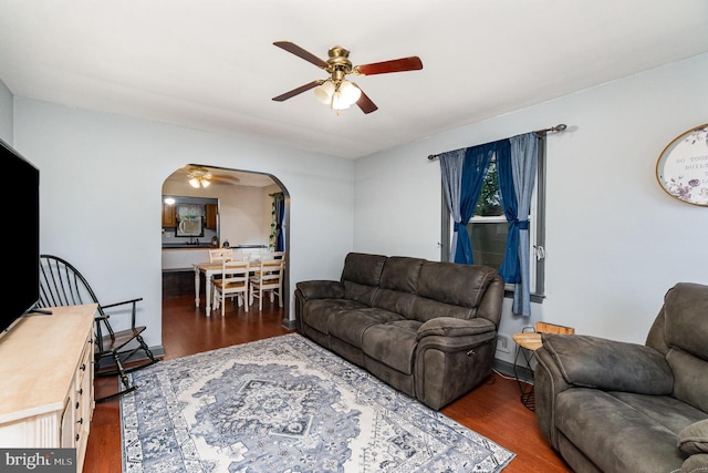 5200 Daybreak Ct, Baltimore, MD 21206 - living area featuring ceiling fan, arched walkways, and wood finished floors