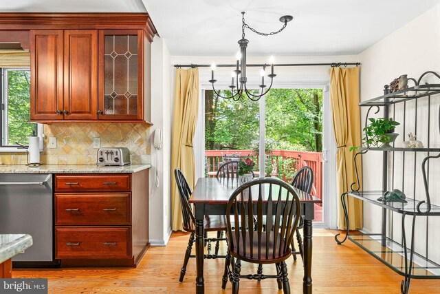 544 N Wayne Ave, Wayne, PA 19087 - dining space featuring a chandelier and light wood-type flooring