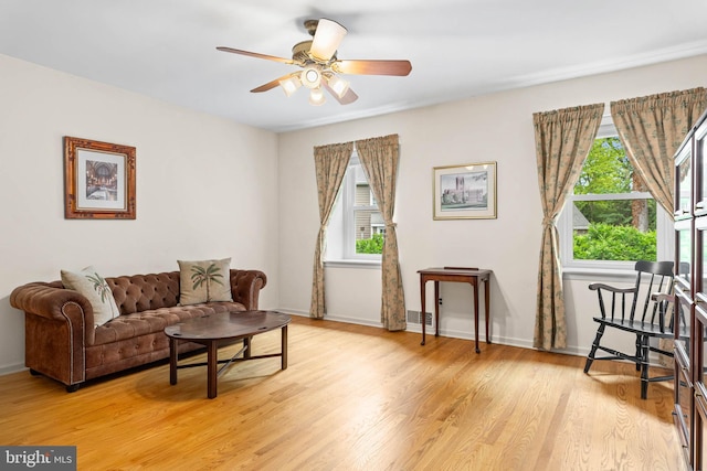 544 N Wayne Ave, Wayne, PA 19087 - living area with light wood-style floors and a ceiling fan