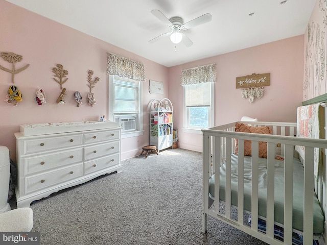 268 N Main St, Red Lion, PA 17356 - carpeted bedroom with a crib, cooling unit, and a ceiling fan