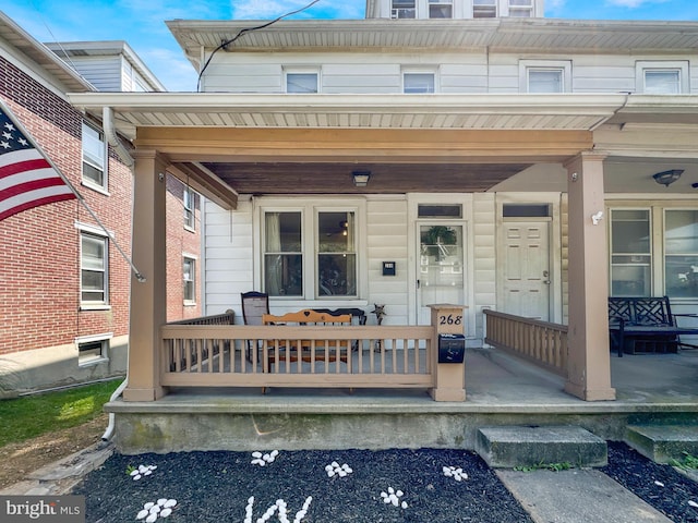 268 N Main St, Red Lion, PA 17356 - doorway to property with covered porch