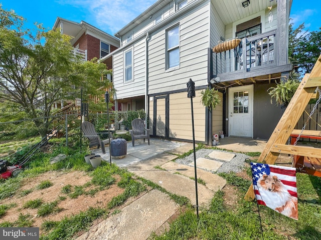 268 N Main St, Red Lion, PA 17356 - back of property with a patio area and a balcony