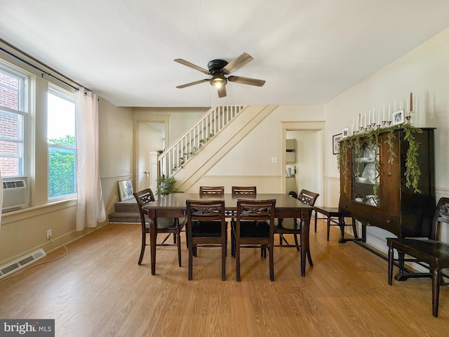 268 N Main St, Red Lion, PA 17356 - dining area with stairs, light wood-style floors, a ceiling fan, and cooling unit