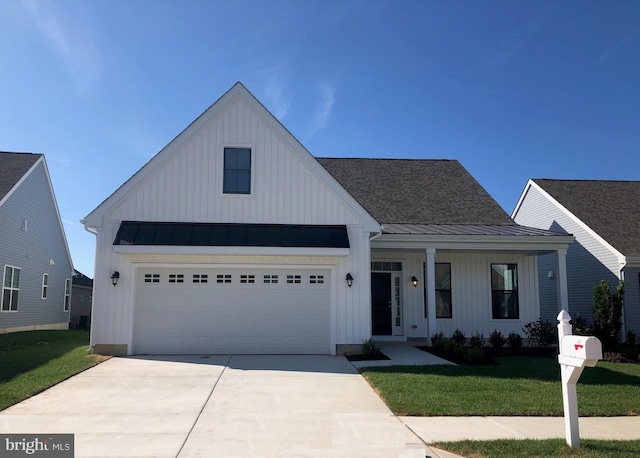 126 Fairmont Ln, Dover, DE 19904 - modern farmhouse featuring a standing seam roof, a front lawn, board and batten siding, and concrete driveway
