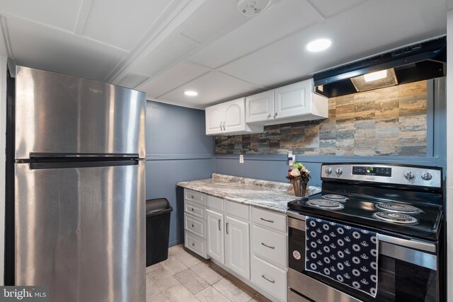 16 N Morley St, Baltimore, MD 21229 - kitchen with stainless steel appliances, ventilation hood, white cabinetry, light stone counters, and recessed lighting