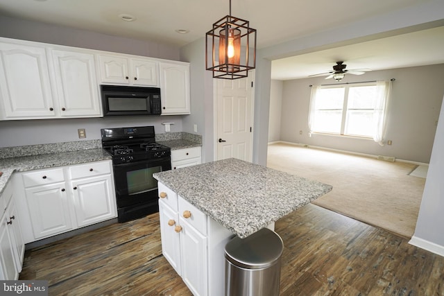 612 S Division St, Fruitland, MD 21826 - kitchen featuring black appliances, open floor plan, light stone countertops, ceiling fan, and recessed lighting