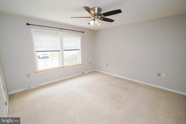 612 S Division St, Fruitland, MD 21826 - spare room with light colored carpet and a ceiling fan
