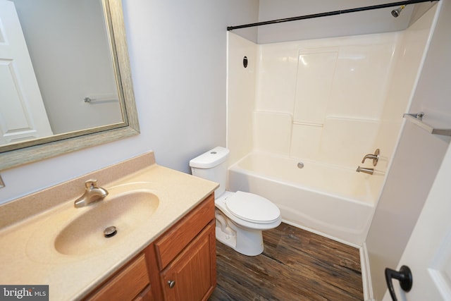 612 S Division St, Fruitland, MD 21826 - bathroom with vanity, wood finished floors, and bathtub / shower combination