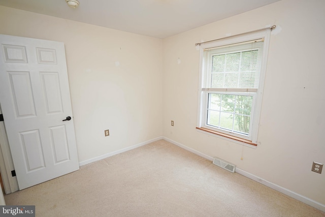 612 S Division St, Fruitland, MD 21826 - spare room with carpet flooring and baseboards