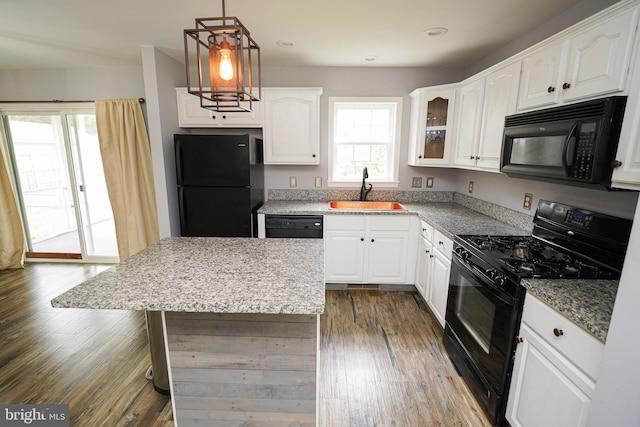 612 S Division St, Fruitland, MD 21826 - kitchen featuring black appliances, white cabinetry, and recessed lighting